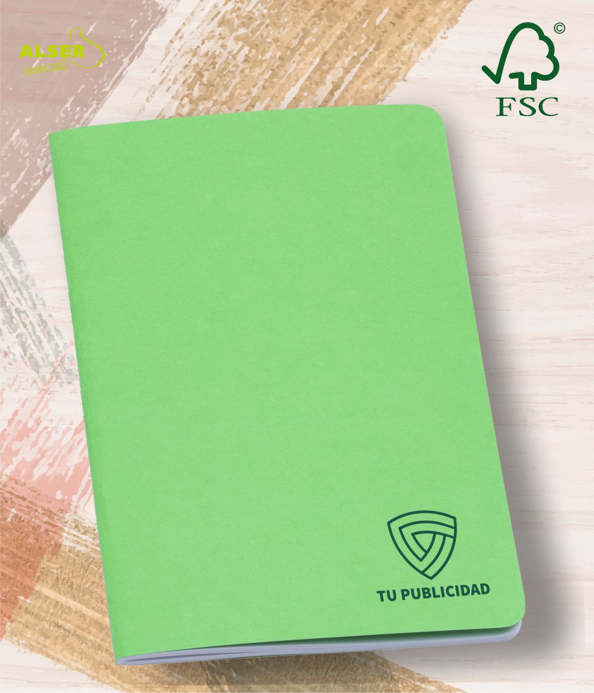 Cuaderno verde con hojas blancas